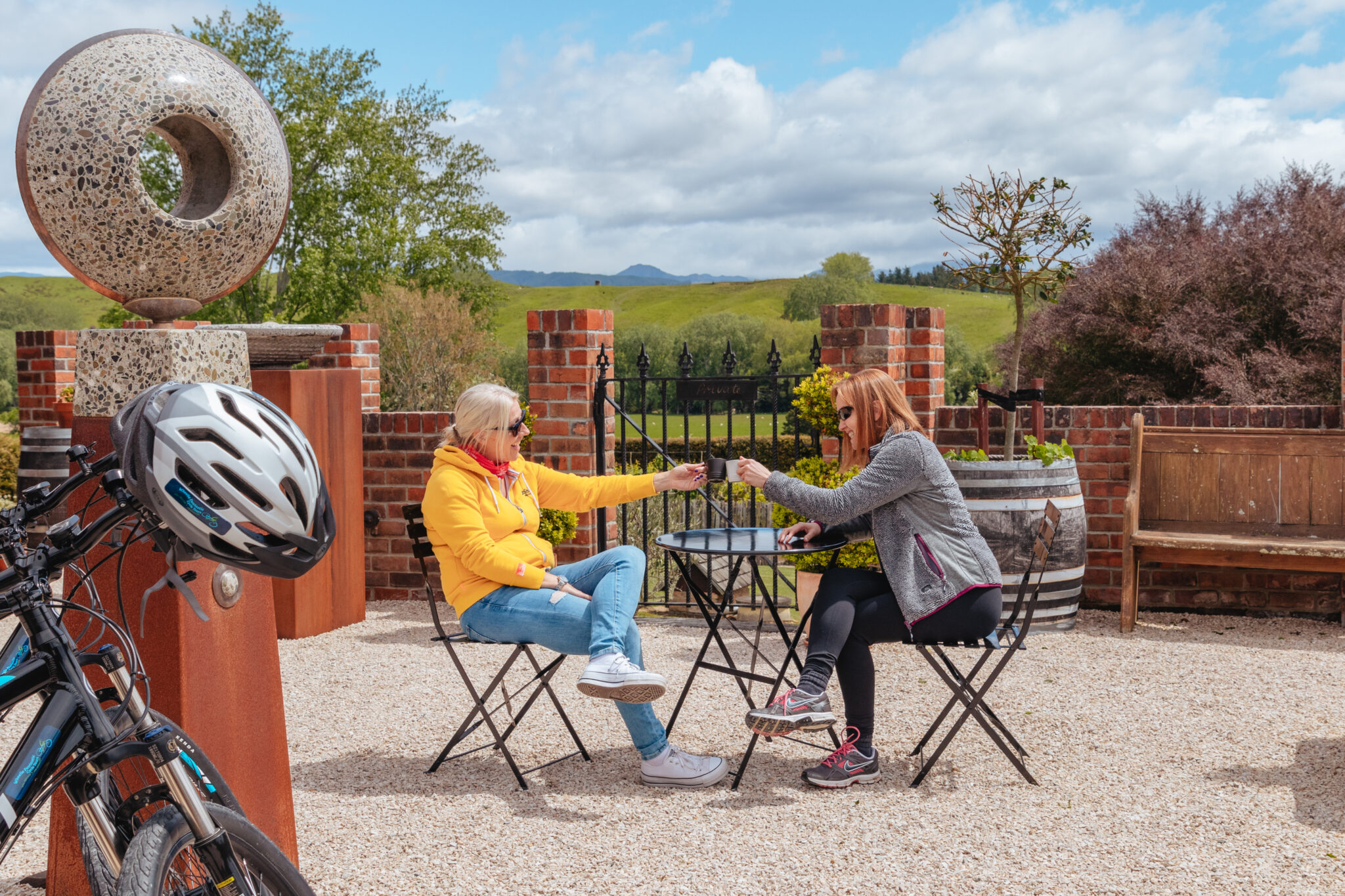 cyclists enjoying a coffee at an art studio