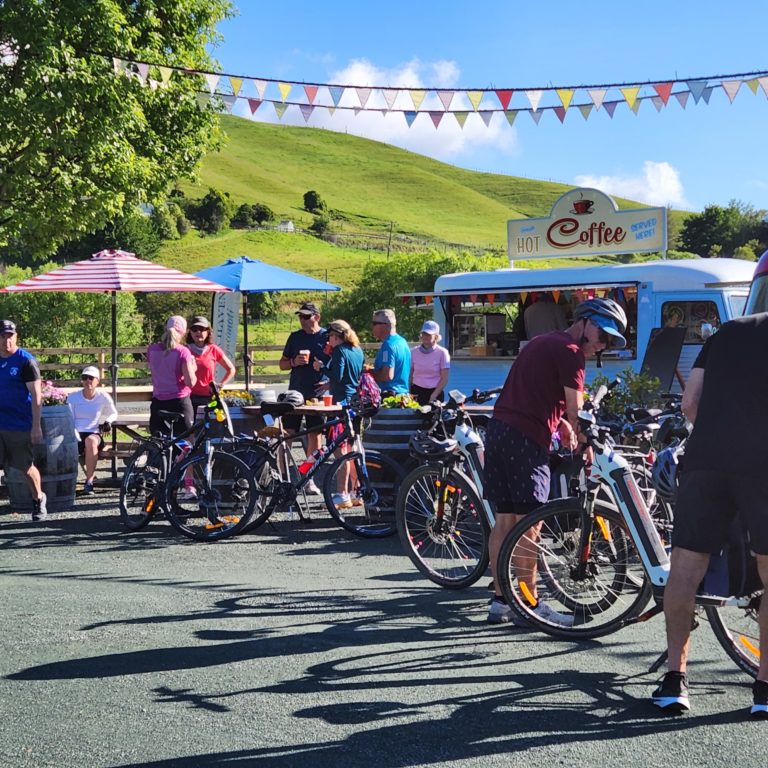 Cyclists at River Haven coffee cart